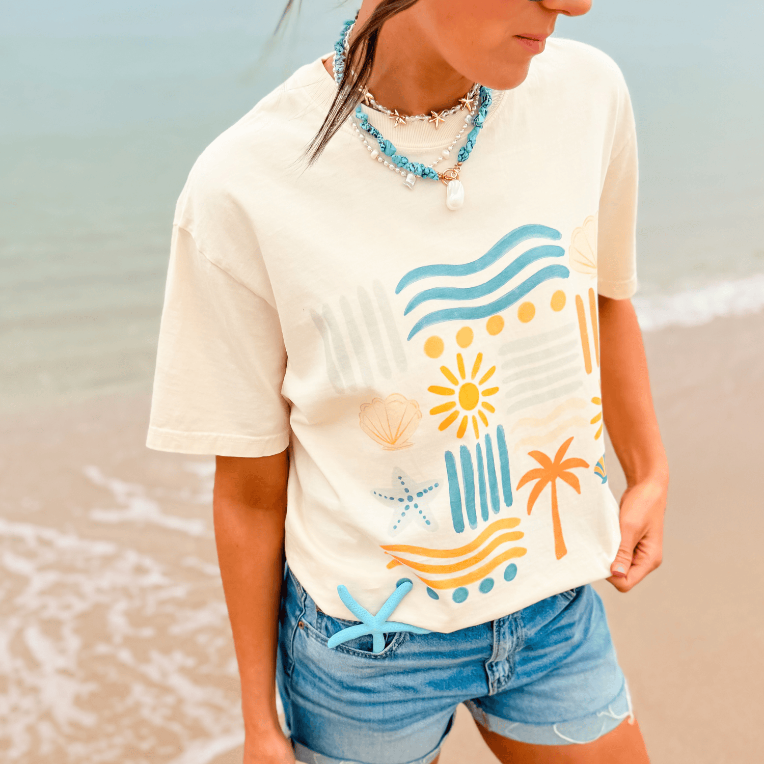 model wearing Beachy Bits Tee