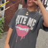woman wearing bite me tee