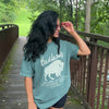 woman wearing badlands tee