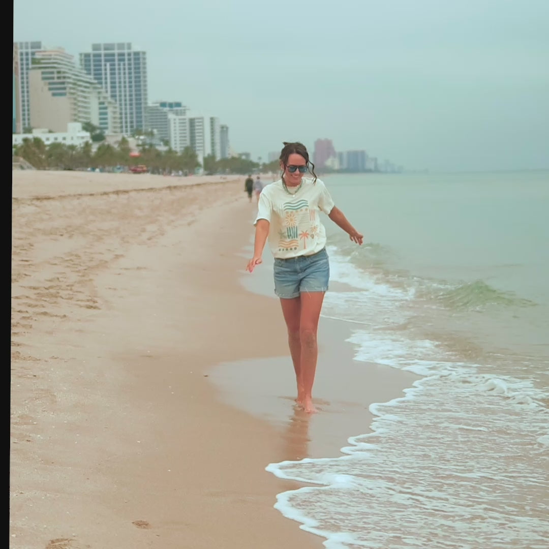 Load video: model wearing Beachy Bits Tee