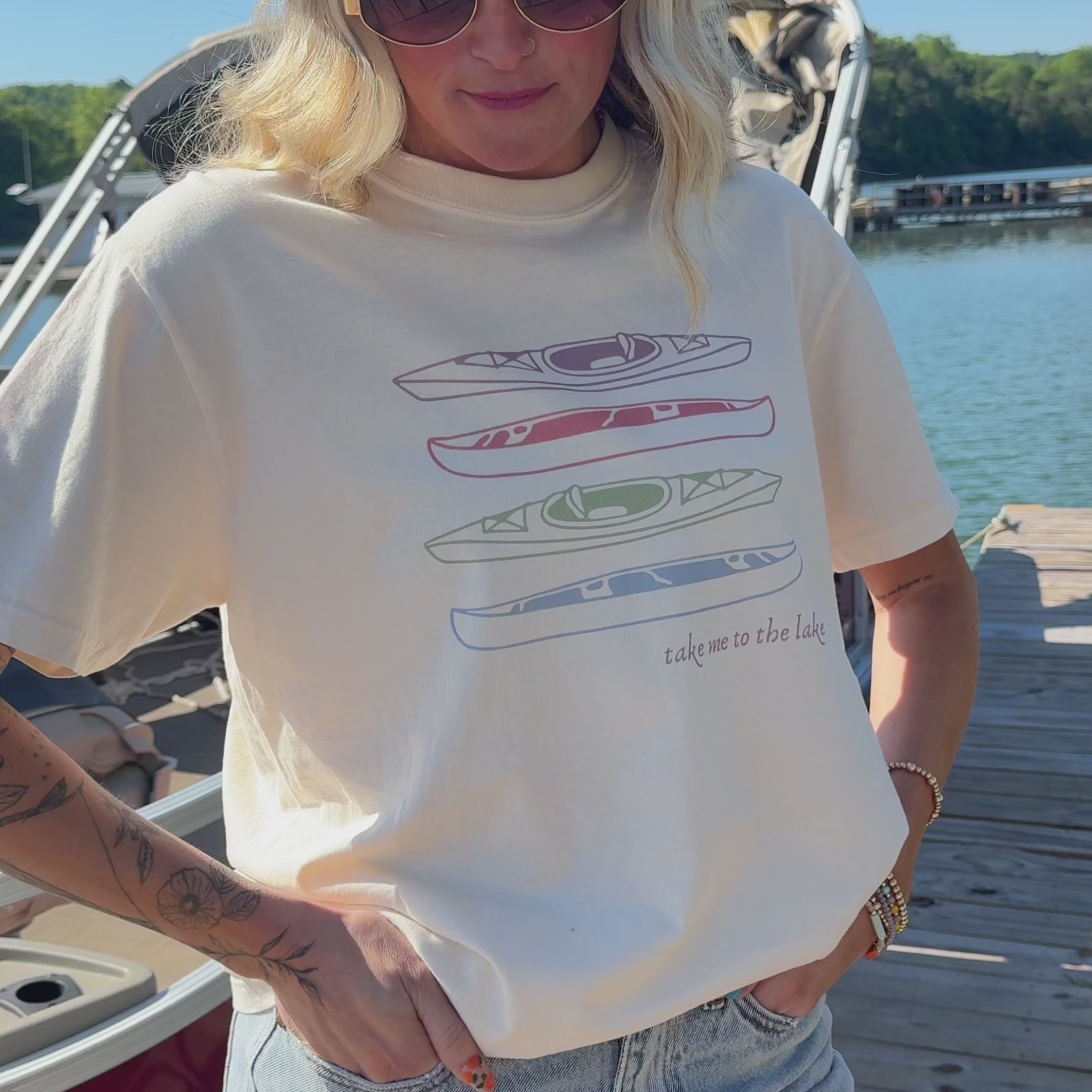 woman wearing take me to the lake tee