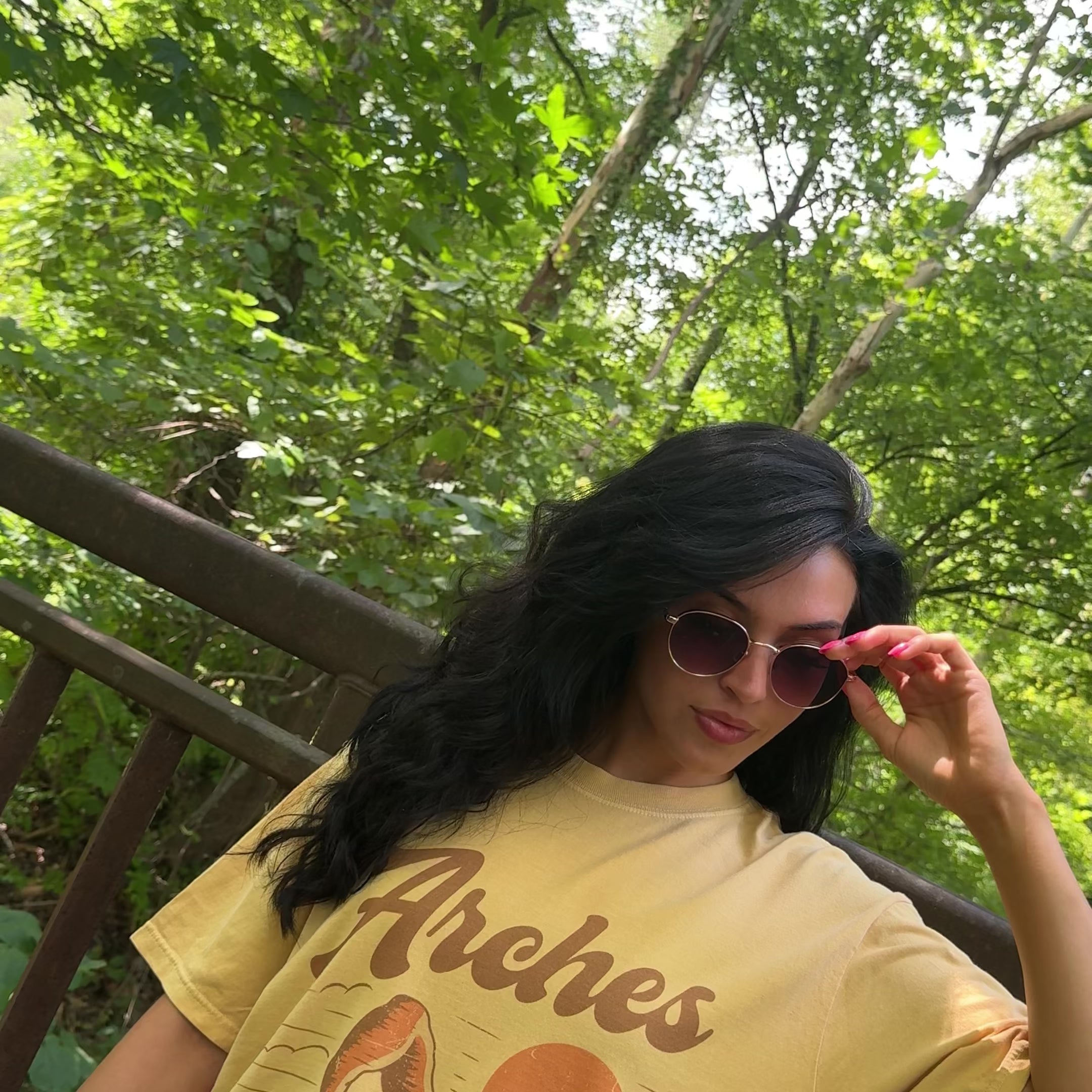 woman wearing arches tee