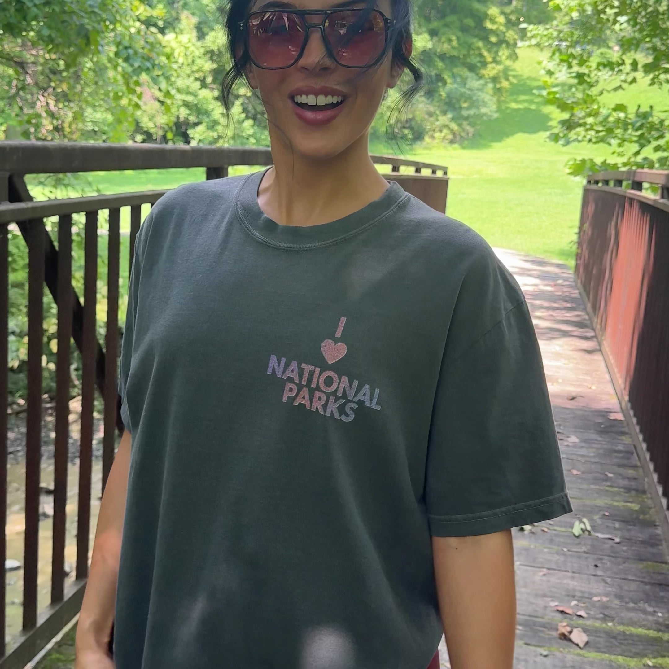 woman wearing national parks checklist tee